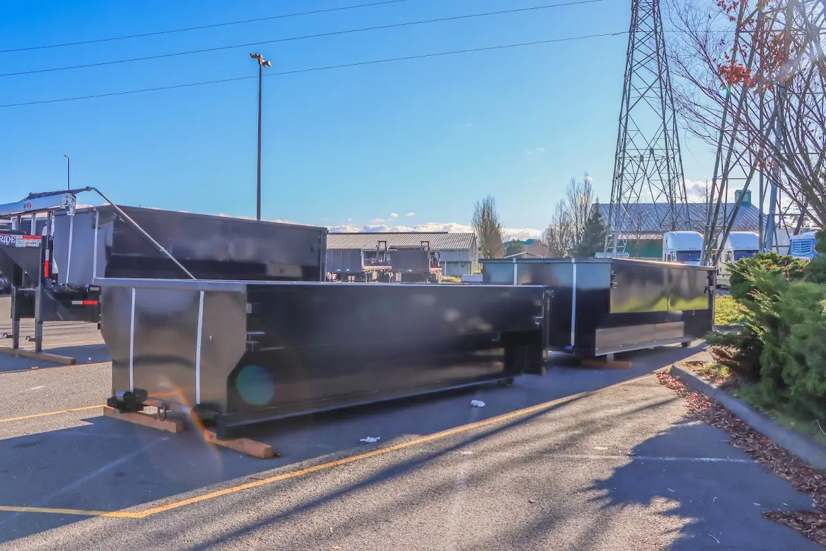 Roll-off dumpster ready for waste disposal at job site for Construction Dumpster Rental in New Hyde Park